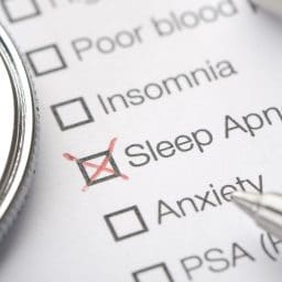 Sleep apnea medical record chart close up with pen