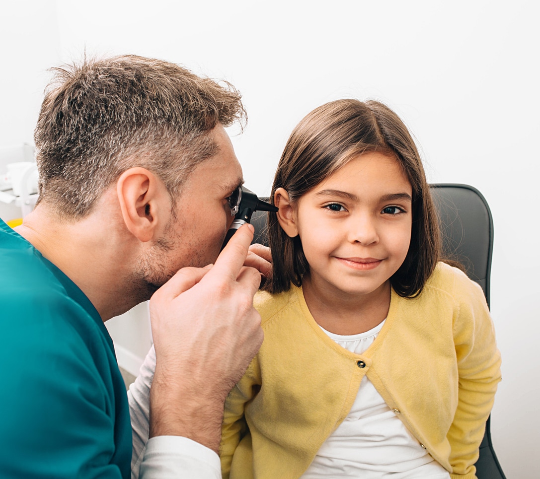 Young girl in an ENT ear exam.