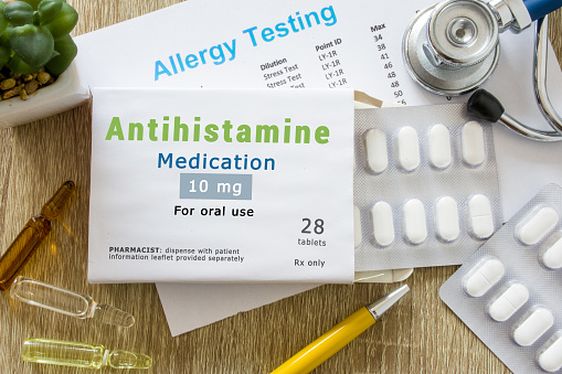 Packet of antihistamines over a sheet that says "allergy testing."